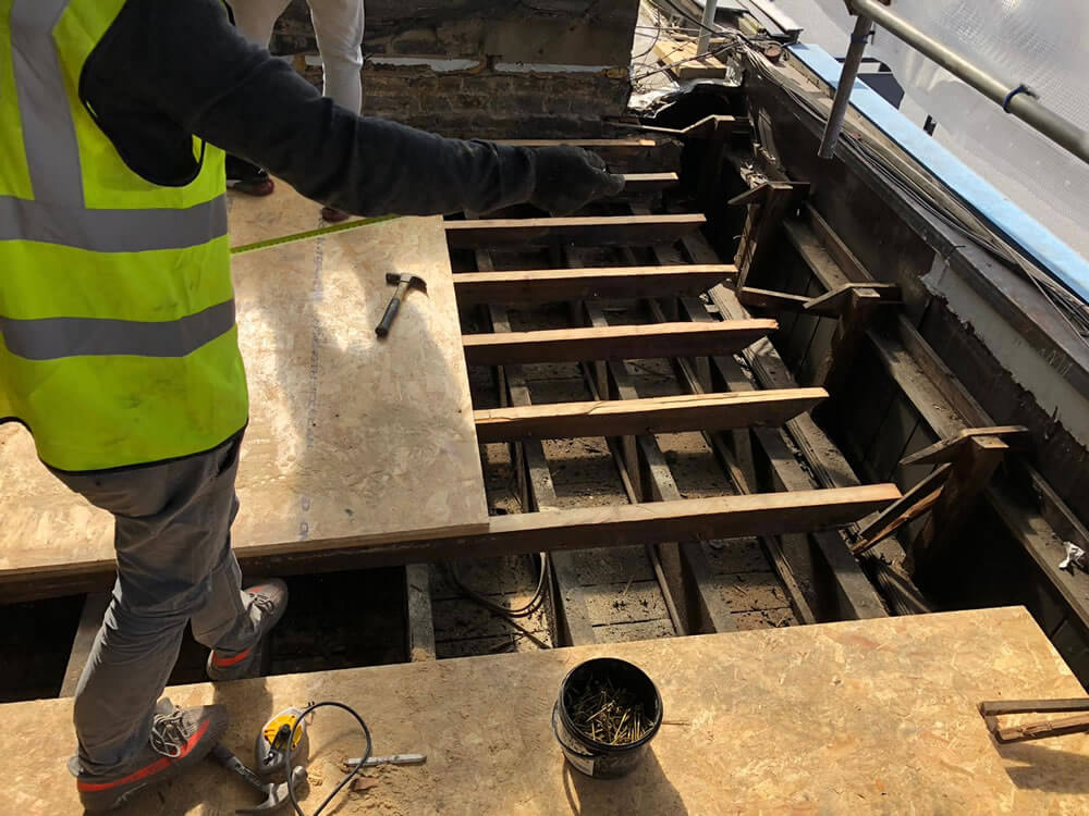 New lead flashing and repaired parapet detail