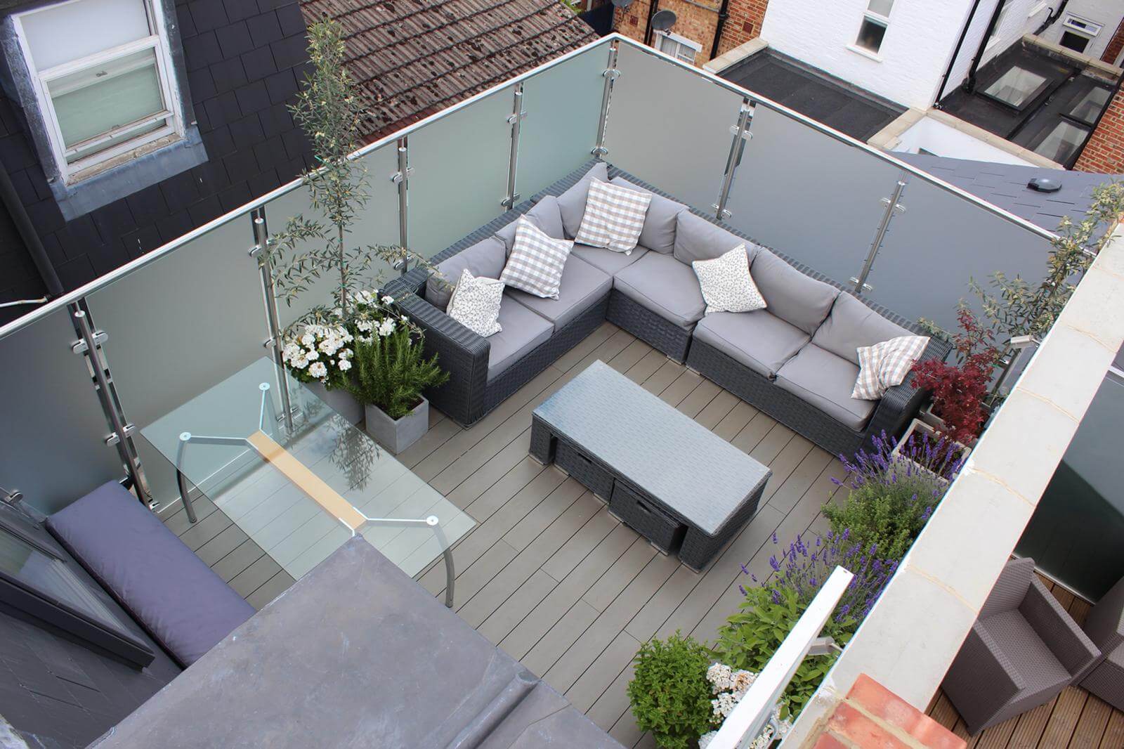 Completed Fulham roof terrace with full-height glass panels
