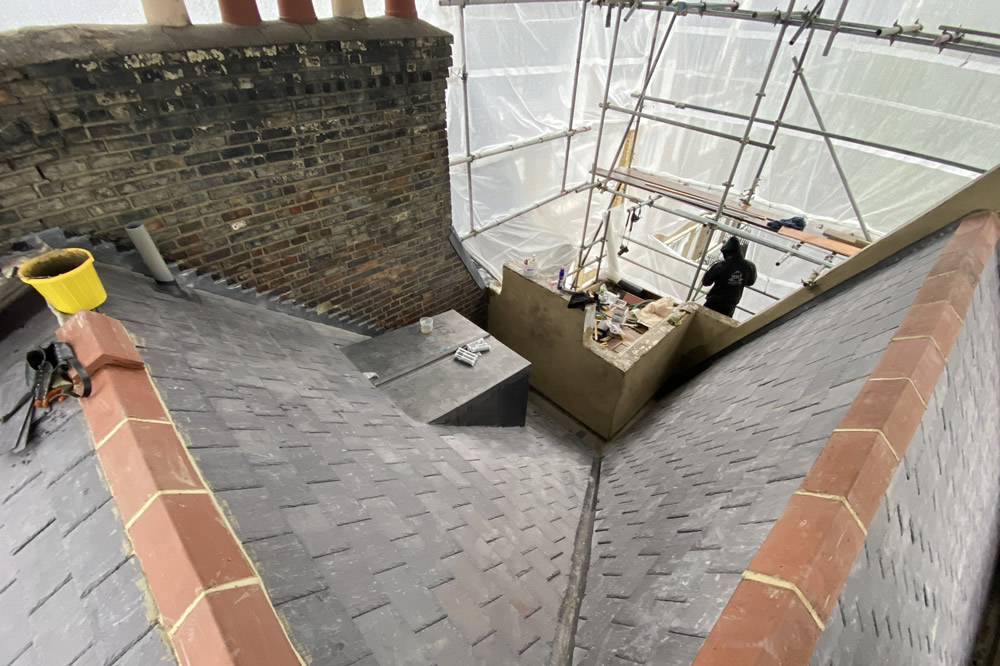 Natural Welsh slate installation on the Lonsdale Square roof