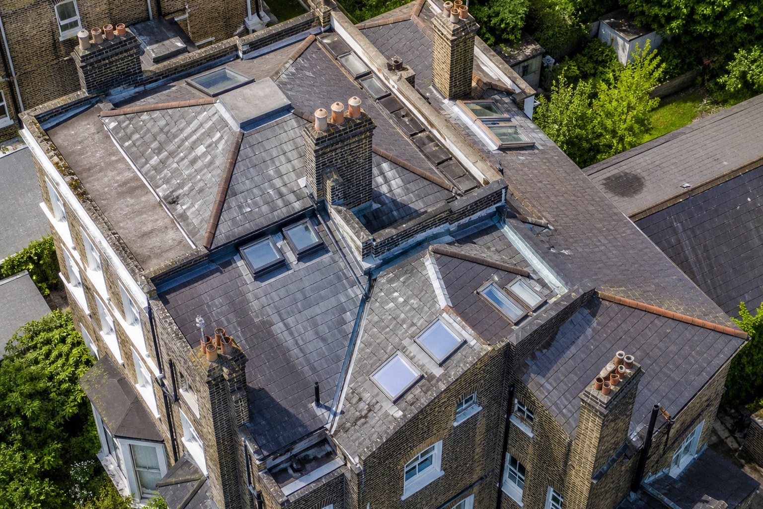 Illustrative aerial overview of a complex London residential roof
