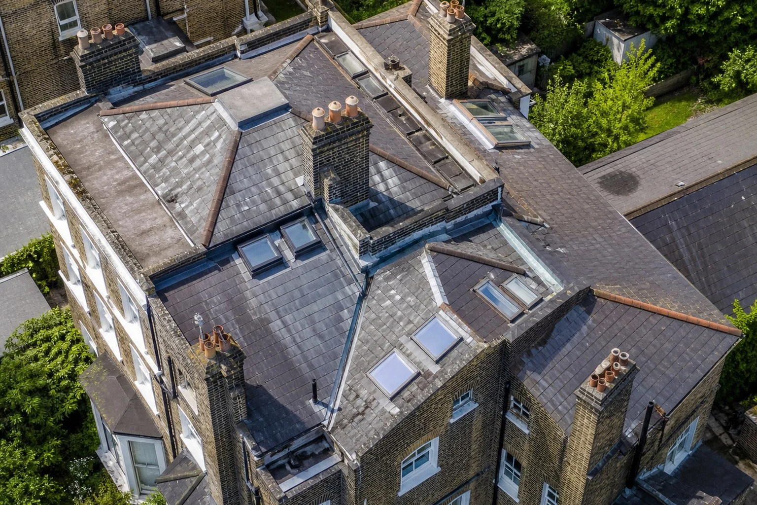 Illustrative aerial overview of a complex London residential roof