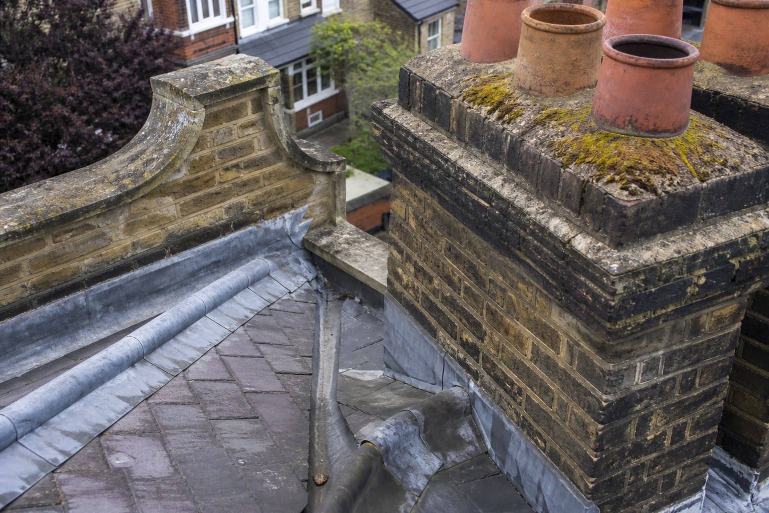 Illustrative aerial view of chimney, parapet and roof junctions