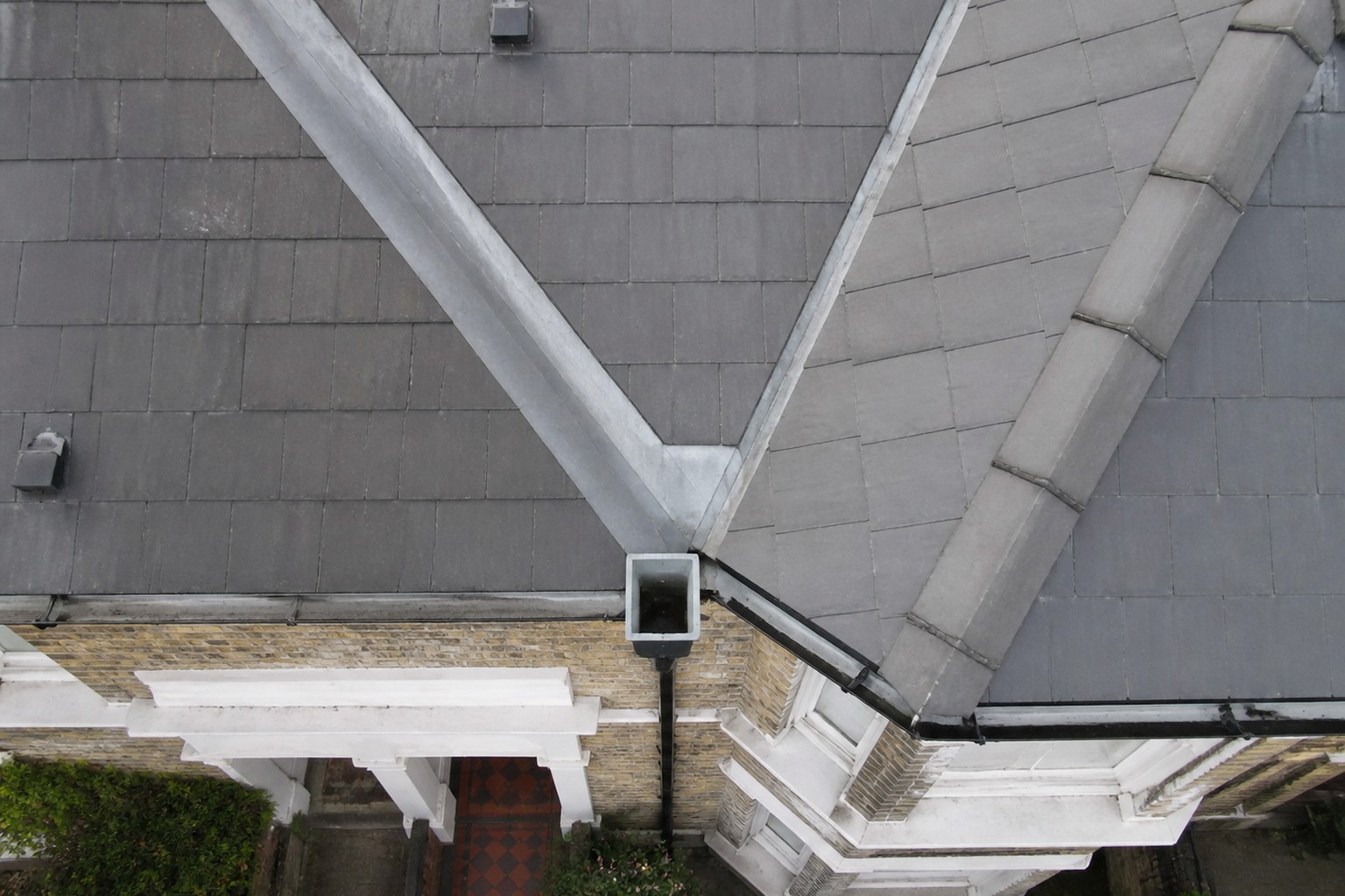 Illustrative aerial view of residential roof drainage routes