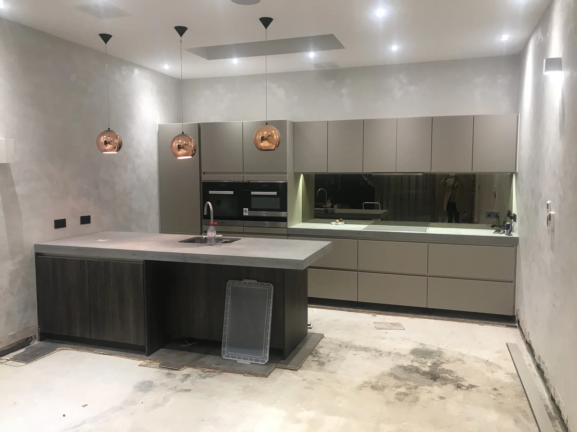 Basement kitchen area during floor and joinery reinstatement