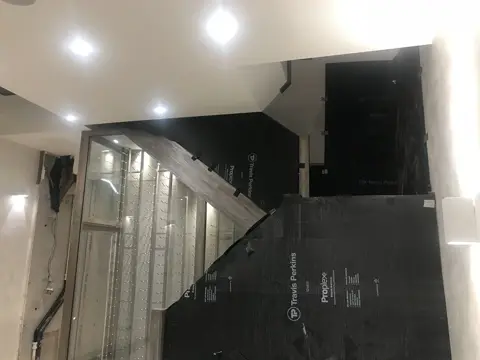 Basement interior during waterproofing and reinstatement