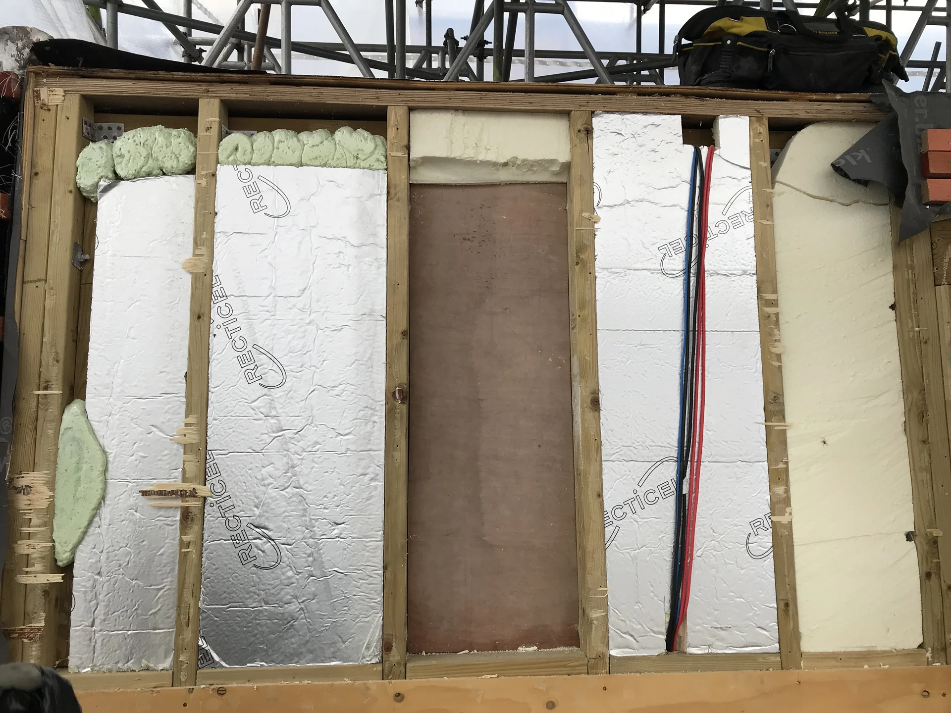 Insulation and timber framing exposed during the main-roof works