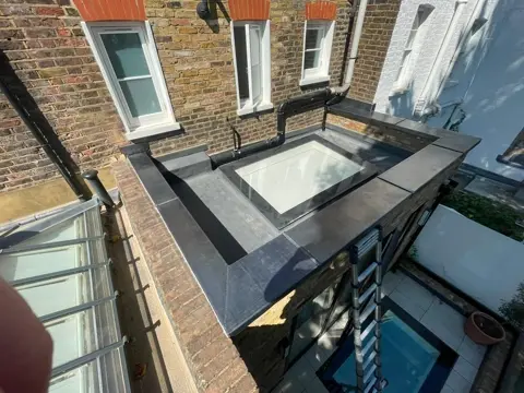 Completed lead capping to the Kensington parapet wall