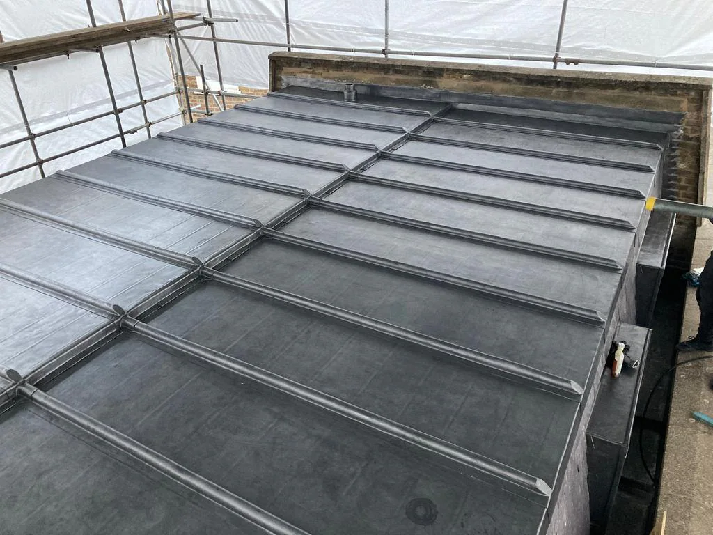 Completed lead roof with formed bays and joints