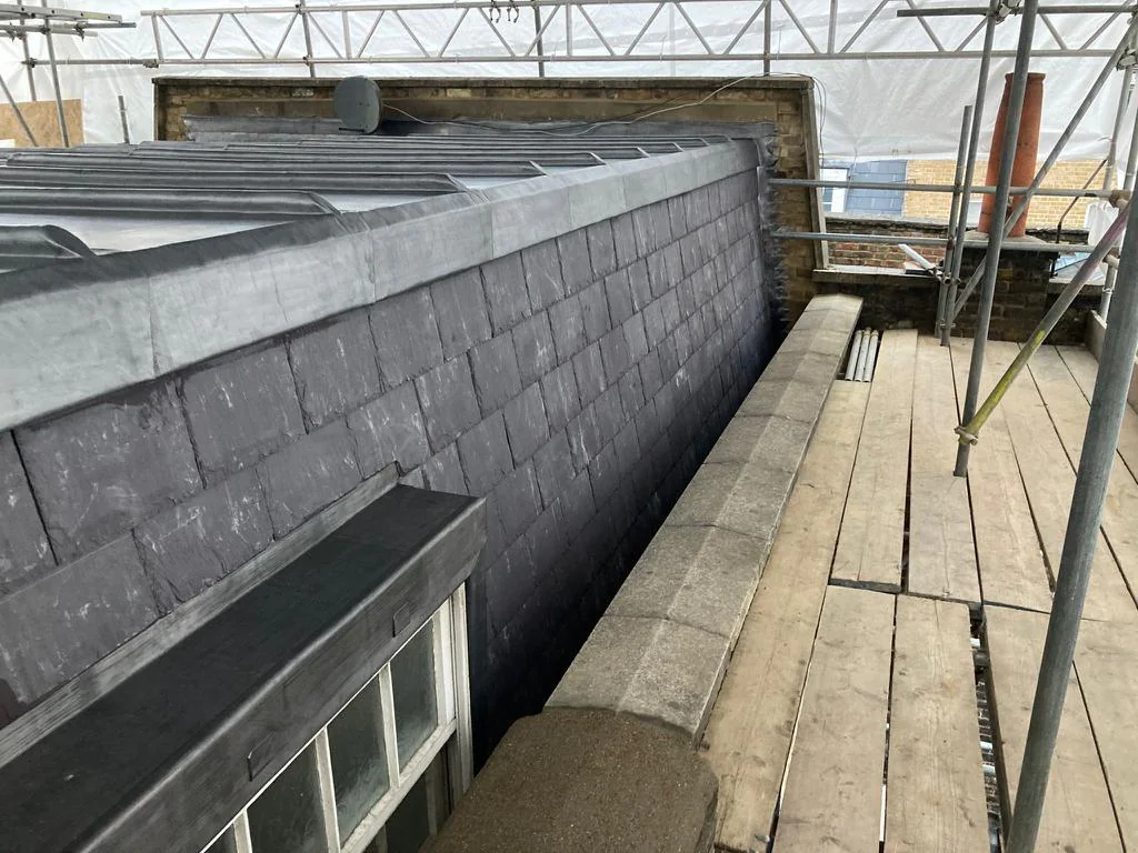 Completed junction between leadwork and slate roofing