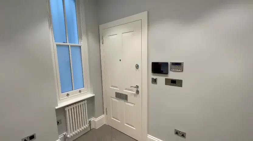 Entrance joinery and smart controls at Nevern Mansions