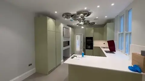 Completed kitchen and dining area at Nevern Mansions