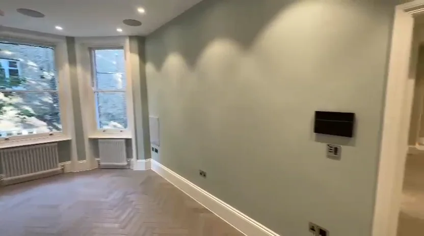 Living room media controls integrated into the refurbishment