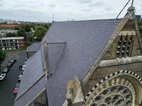 Oblique aerial view of the church roof and gable