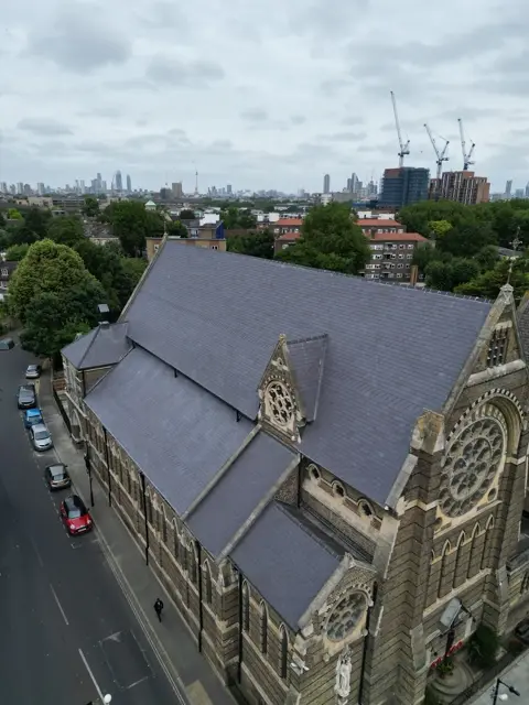 Aerial overview of the church roof and adjoining pitches
