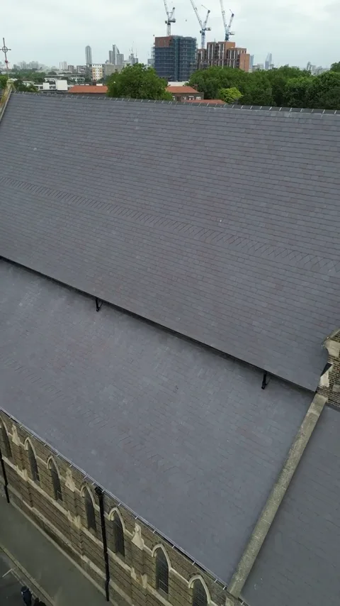Play aerial view of the completed church roof