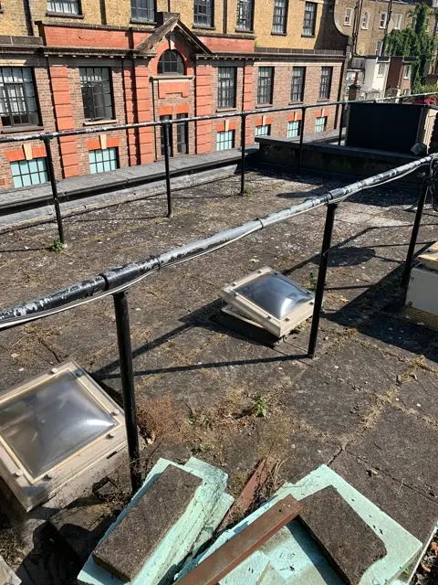 Illustrative reconstruction of the existing asphalt roof and domed rooflights before the Paddington refurbishment
