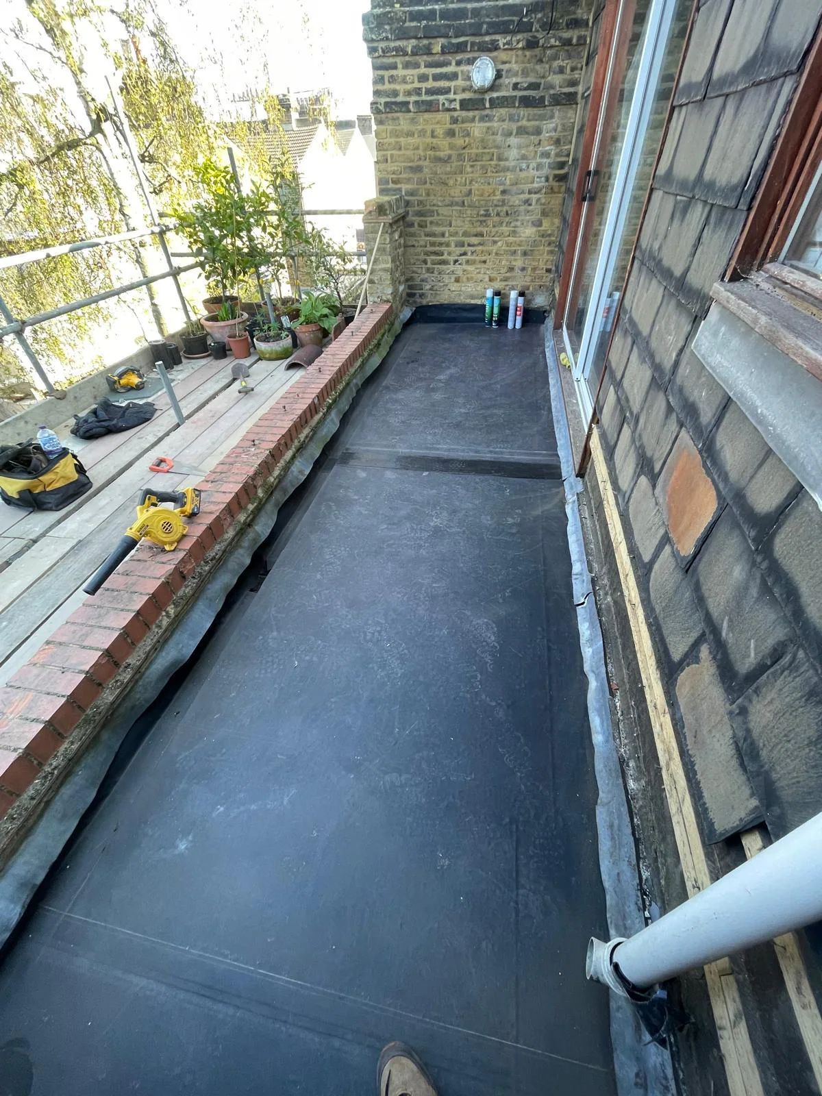 Overview of the completed EPDM porch roof