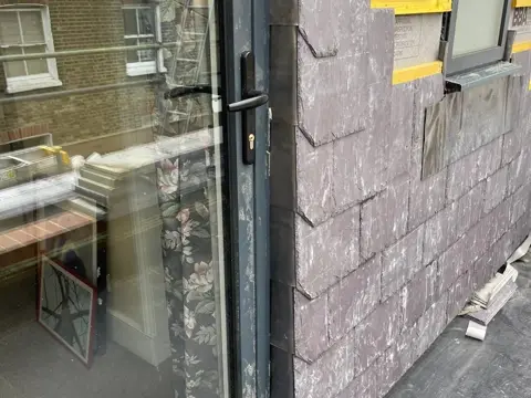Completed Welsh slate and EPDM porch roof in SW8