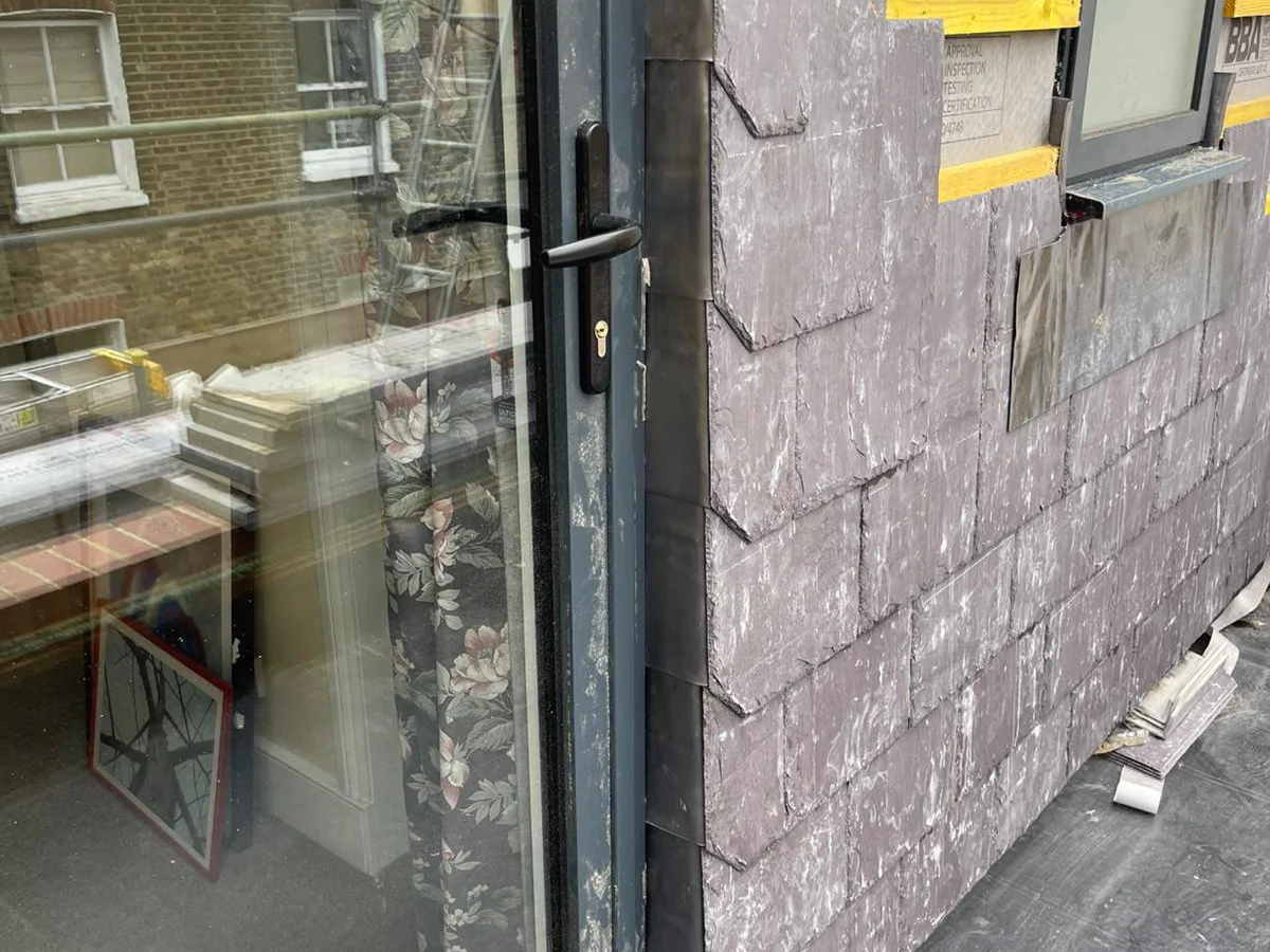 Completed Welsh slate and EPDM porch roof in SW8